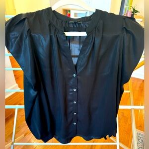Black long sleeve button down with puff sleeves.